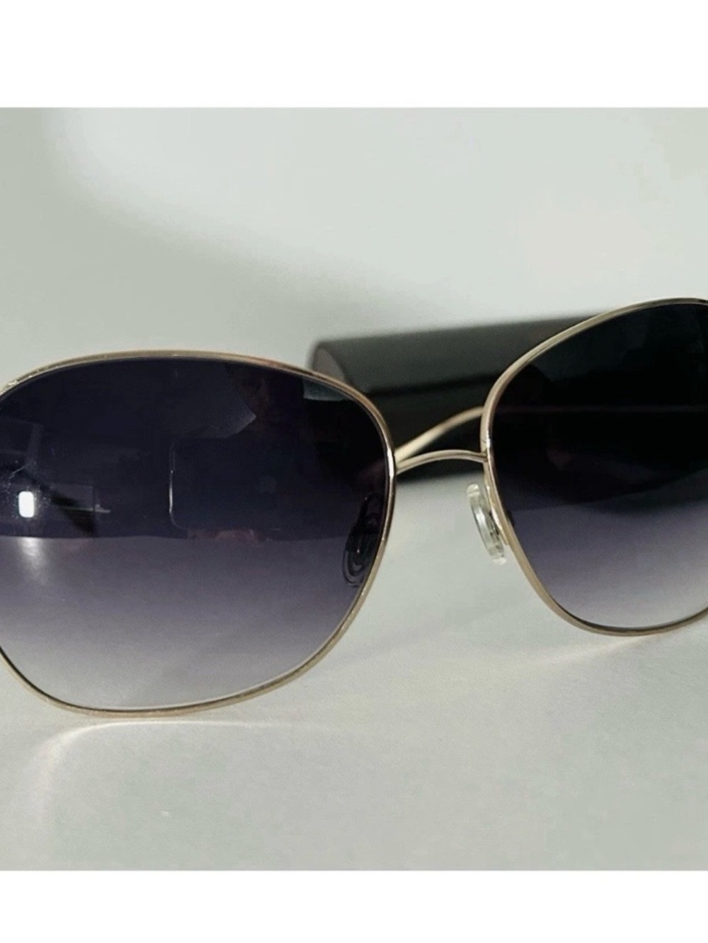 Oliver Peoples Gold Frame Sunglasses with Gradient dark violet lens